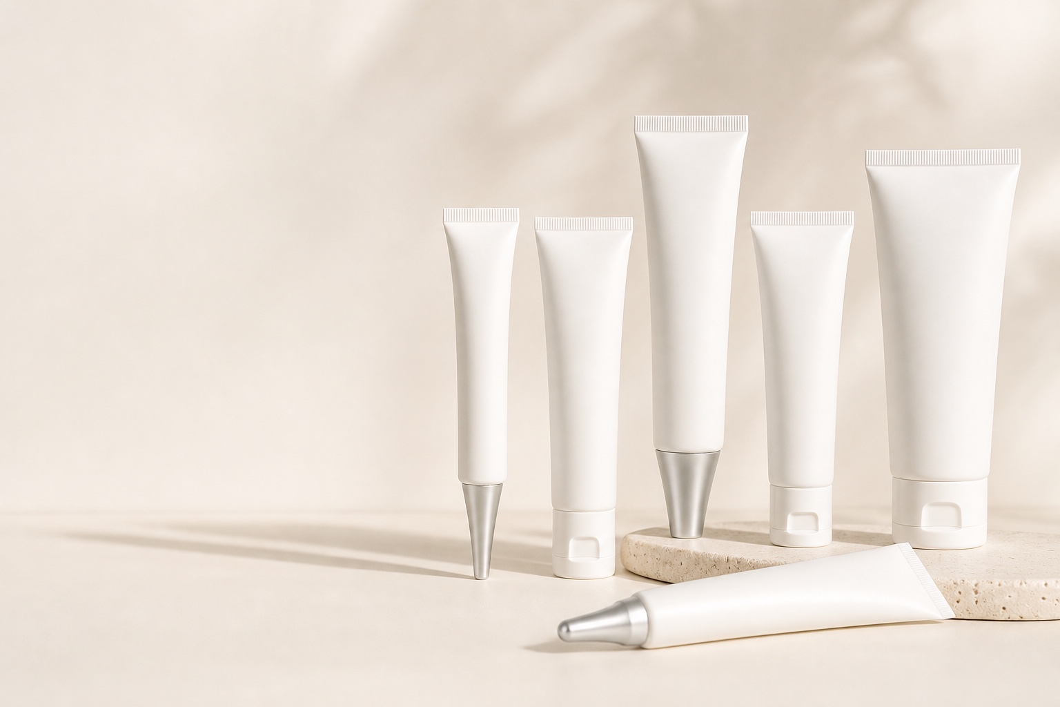 Cosmetic treatment tube collection in white — Vella packaging supplier